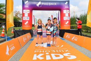 Children with medals at Pho3nix Kids finish line