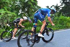 Triathletes racing closely on bike course at Laguna Phuket Triathlon Thailand