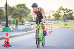 Triathlete cycling on road TriDash Thailand